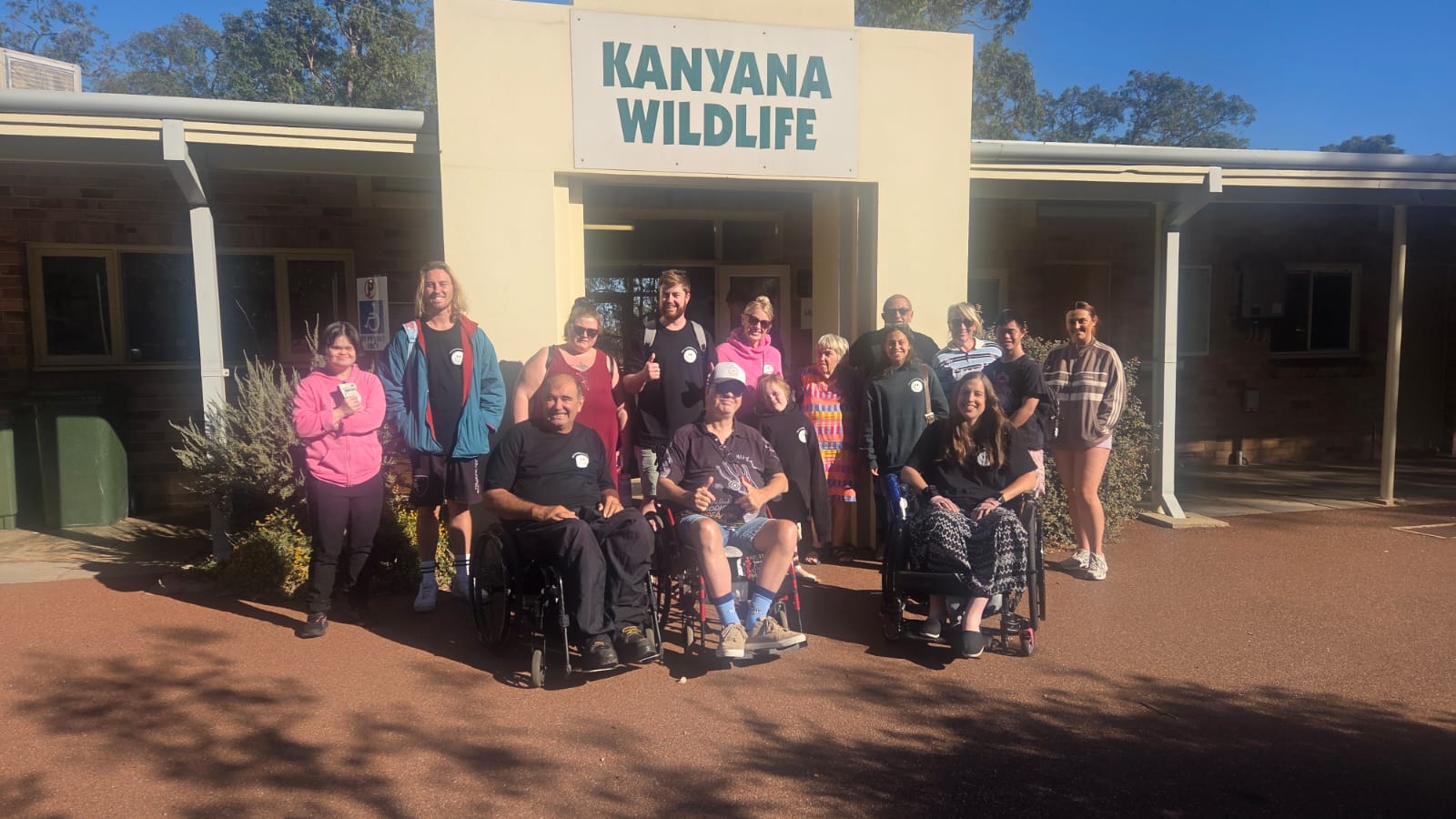 Happiness Crew staff and participants together in the community.