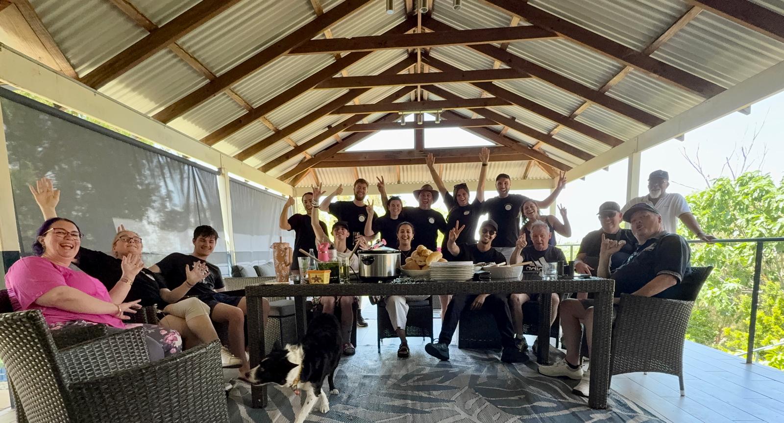 A group sharing an outdoor meal together during a supported short break